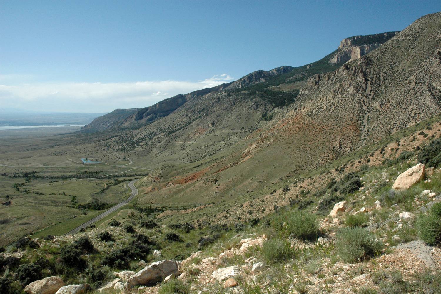 The western edge of the Bighorn Mountains falling away to the basin below.